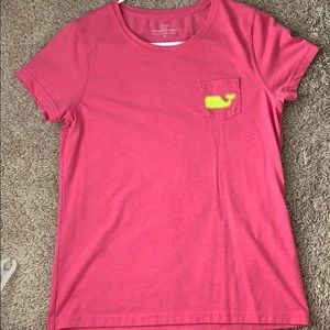 Pink short sleeve vineyard vines shirt.